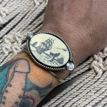 Load image into Gallery viewer, Faux scrimshaw ship and whale cuff bracelet