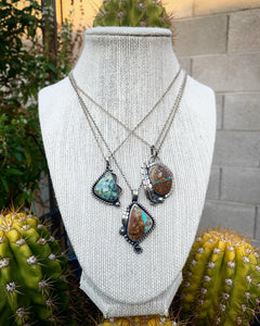 Royston ribbon turquoise and leaf pendant necklace