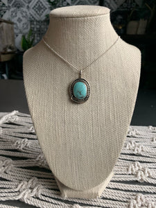 Turquoise and leaf pendant necklace