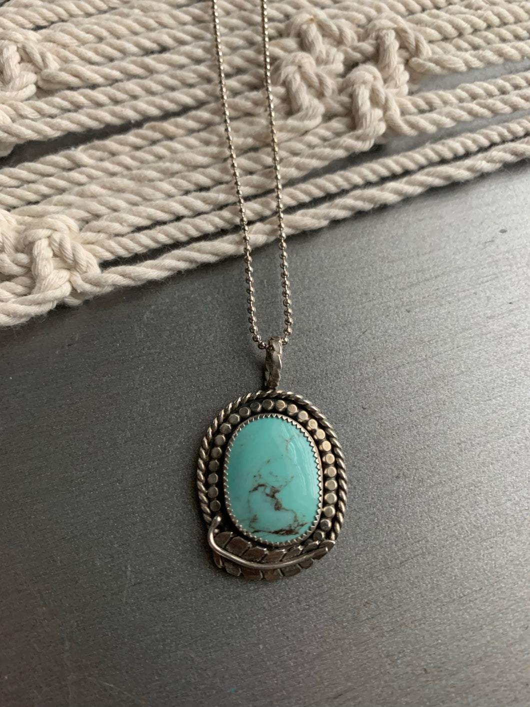 Turquoise and leaf pendant necklace